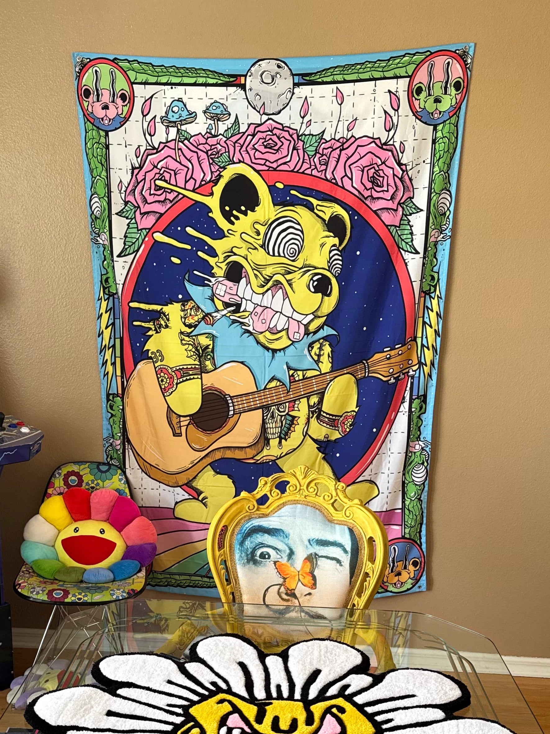 Colorful room interior with posters, a mirror, and decorative items on a wall.