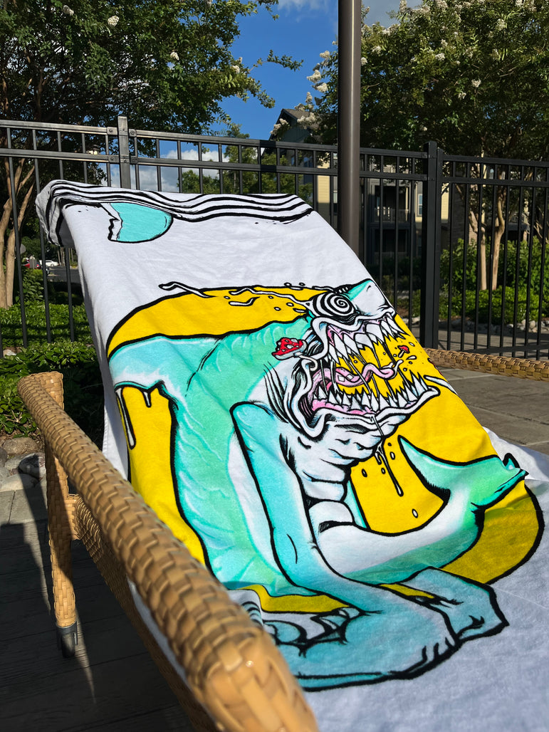 Aaron Brooks’ “Spun Sea Puppy” Beach Towel